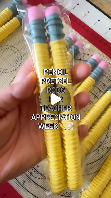 a person is holding some yellow and blue pencils in their hand with the words pencil pretzel rods teacher appreciation week written on it