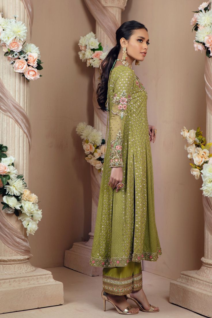 Emira | Pakistani Designer Outfit | Sarosh Salman Green Chanderi Dress For Reception, Green Floor-length Kurta For Reception, Green Georgette Kurta For Reception, Green Anarkali Churidar For Reception, Green Kurta With Mirror Work And Traditional Drape, Eid Semi-stitched Hand Embellished Anarkali Set, Bollywood Style Pista Green Anarkali Set With Mirror Work, Anarkali Green Georgette Churidar, Pista Green Bollywood Anarkali Set With Mirror Work