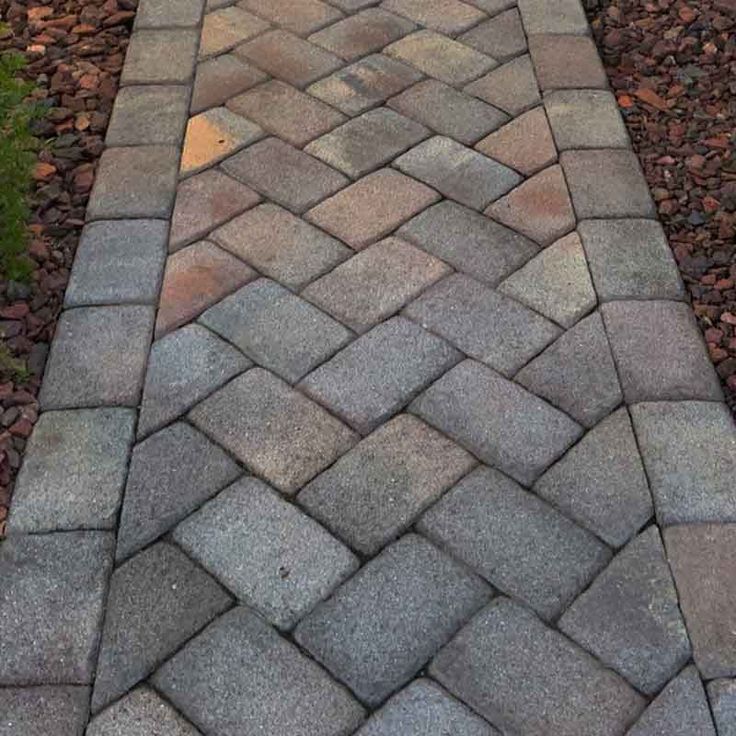 an image of a walkway made out of cobblestones