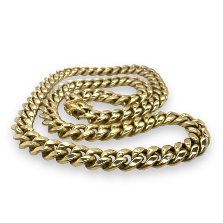 Crafted from lustrous 14K Yellow Gold, the chain exudes a warm, golden glow that complements a diverse range of styles. The 26-inch length ensures versatility, making it an ideal choice for both men and women who appreciate statement jewelry. Whether worn as a standalone piece or layered with other accessories, this chain effortlessly elevates any ensemble. Metal: 14K Yellow Gold Weight: 79 grams Width: 11mm Length: 26" Unisex Classic Jewelry With Chunky Cuban Link Chain, Classic Cuban Link Chunky Chain Jewelry, Yellow Gold Cuban Link Chain Necklace, Classic Cuban Link Necklace With Polished Finish, Classic Yellow Gold Jewelry With Chunky Chain, Classic 14k Gold Cuban Link Necklace With Oval Links, Luxury Yellow Gold Cuban Link Necklace, Classic 14k Gold Oval Link Cuban Necklace, Classic Polished Cuban Link Necklace