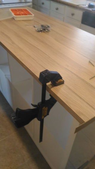 a kitchen counter that has some tools on it