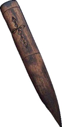 a wooden knife with an intricate design on it