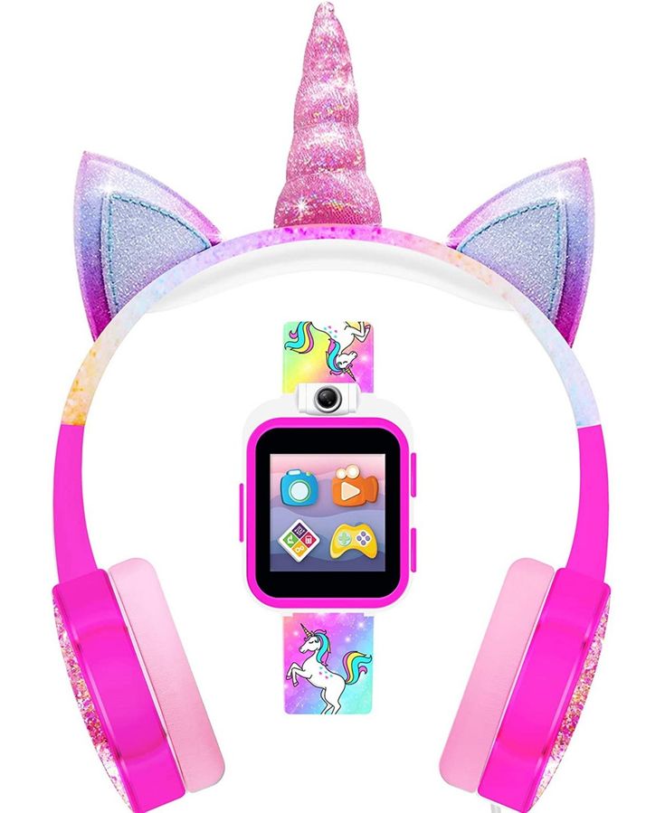 the pink unicorn headphones are next to an ipod