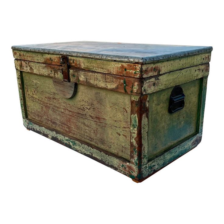 an old wooden chest with metal latches on the top and bottom, sitting against a white background