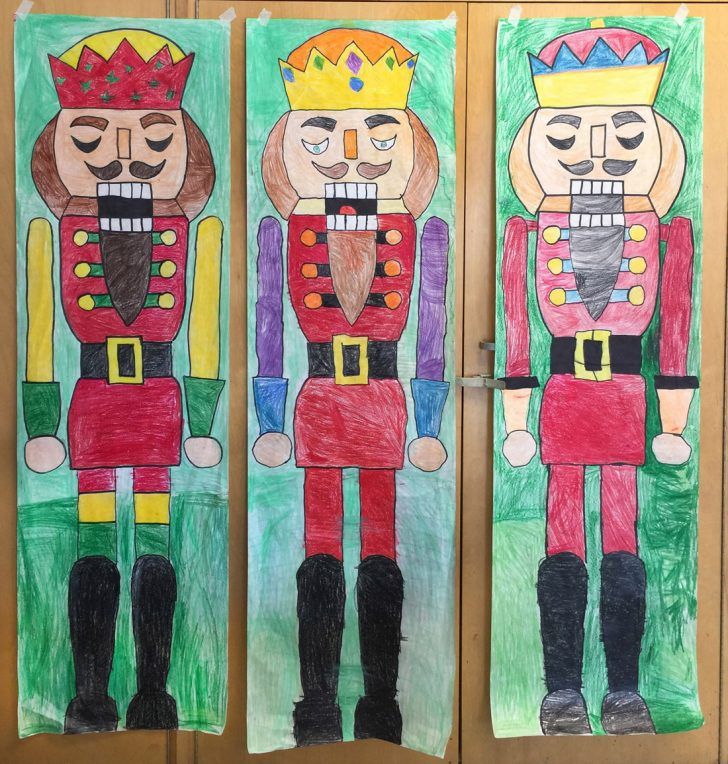 two children's art projects depicting the nutcrackers and the king in red