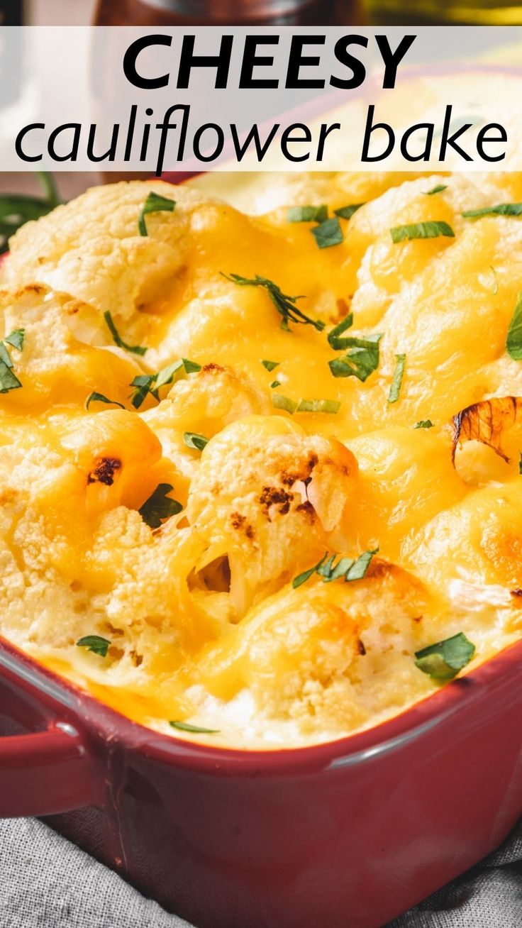 cheesy cauliflower bake in a red casserole dish