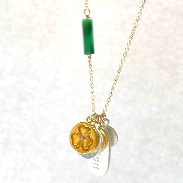 Build your own beautiful Notre Dame charm necklace from an assortment of 24k gold vermeil charms. All charms are hand made and no two are the same. Some charms may have crystals. Charms shown in silver and gold vermeil. How to design your necklace: 1) choose the number of charms you would like 2) enter the names of the charms in the boxes. Please use the following charm descriptions: Shamrock / ND / Number / Irish / Cross If you would like your player number, please just enter the number in the Dainty Round Pendant Charm Necklace For Good Luck, Sterling Silver Vintage Charm Necklace For Gift, Yellow Gold Charm Necklaces With Dangling Charms For Gift, Yellow Gold Charm Necklace With Dangling Charms For Gift, Yellow Gold Charm Necklace With Dangling Charms, Green Charms Jewelry For Good Luck, Good Luck Medallion Necklace With Charms, Heirloom Necklaces With Charms, Heirloom Round Charm Necklaces