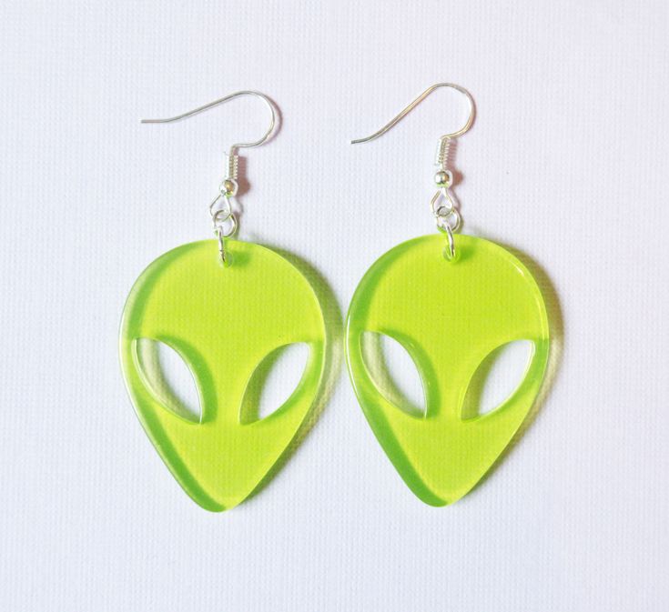 A pair of neon green alien earrings ♡ Each alien charm is 4cm  Comes with rubber earring backs Scenecore Earrings, Green Fun Plastic Jewelry, Fun Green Plastic Jewelry, Green Fun Drop Earrings, Fun Green Drop Earrings, Neon Yellow Drop Earrings As A Gift, Green Plastic Jewelry For Gifts, Green Plastic Earrings For Gifts, Green Dangle Novelty Jewelry