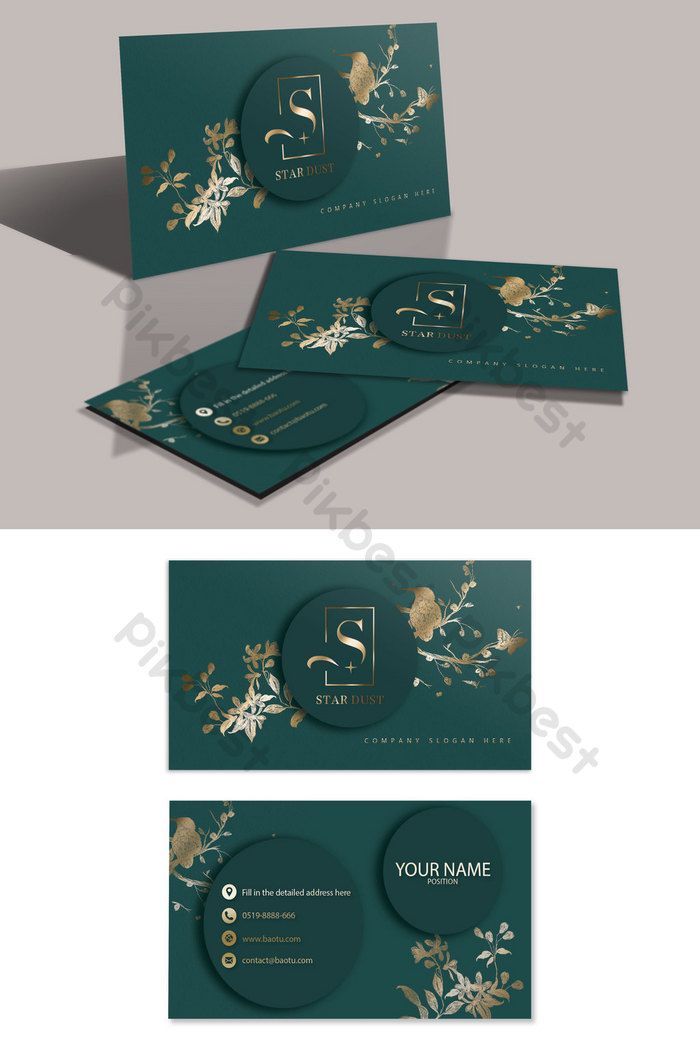 a green business card with gold foil flowers and leaves on the front, two side by side