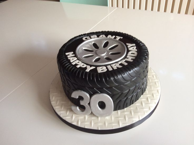 a birthday cake with the number thirty on it