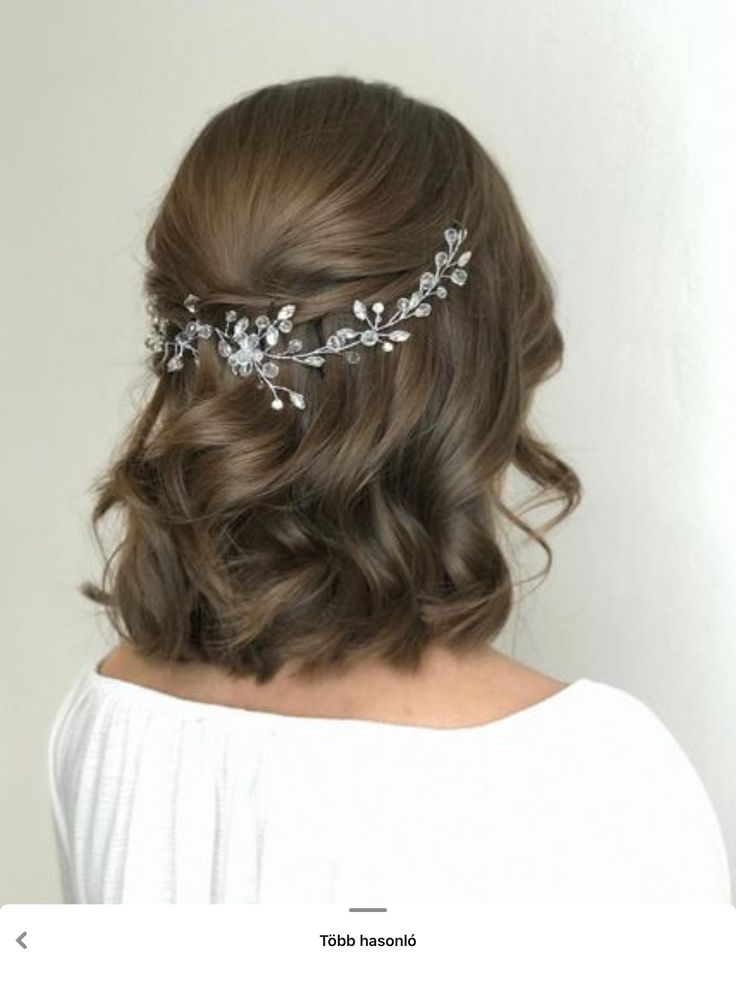 a woman wearing a bridal hair comb