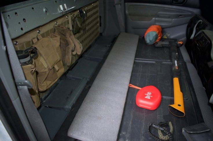 the back seat of a vehicle with tools in it