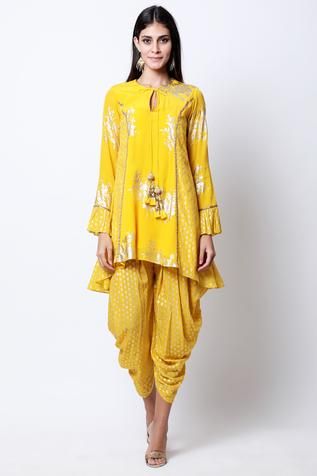 Shop for Nikasha Gold Printed Kurta Set for Women Online at Aza Fashions Gold Drapes, Asymmetric Tunic, Indian Fashion Trends, Drape Pants, Kurta Set For Women, Dhoti Pants, Designer Ethnic Wear, Cord Set, Cotton Linen Dresses