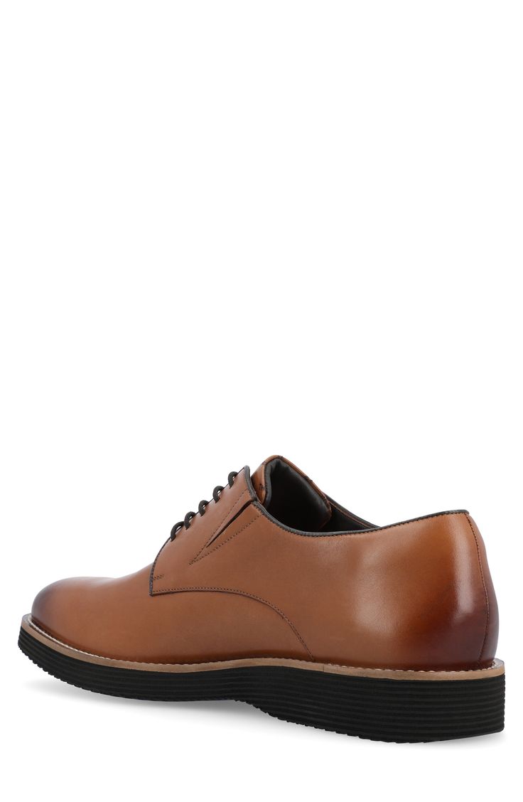 A Tru Comfort Foam insole creates all day comfort in a plain toe lace-up crafted from smooth leather. Lace-up Cushioned insoles Leather upper/manmade sole Imported Brown Lace-up Shoes With Textured Sole For Derby, Brown Moc Toe Lace-up Shoes With Leather Footbed, Brown Lace-up Shoes With Leather Sole And Plain Toe, Brown Plain Toe Lace-up Shoes With Leather Sole, Brown Plain Toe Lace-up Shoes For Business Casual, Cognac Plain Toe Oxfords For Business Casual, Classic Brown Lace-up Shoes With Plain Toe, Classic Brown Plain Toe Lace-up Shoes, Classic Brown Leather Shoes With Ortholite Insole