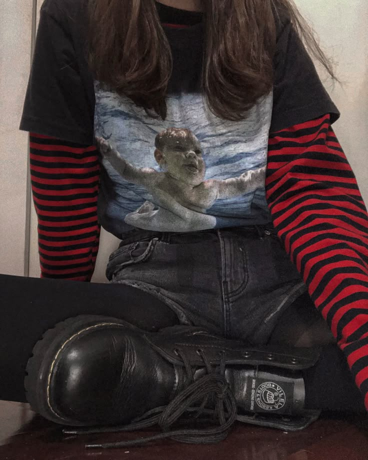 Grunge style, nirvana T-shirt, striped shirt Red Striped Shirt Outfit Aesthetic, Grunge Striped Shirt, Layered Turtleneck Outfit Grunge, Layered Striped Shirt Outfit, Grunge Outfits Nirvana, Nirvana Style Outfits, Striped Turtleneck Outfit Layered, Striped Shirt Outfit Grunge, Layered Shirts Outfit Grunge