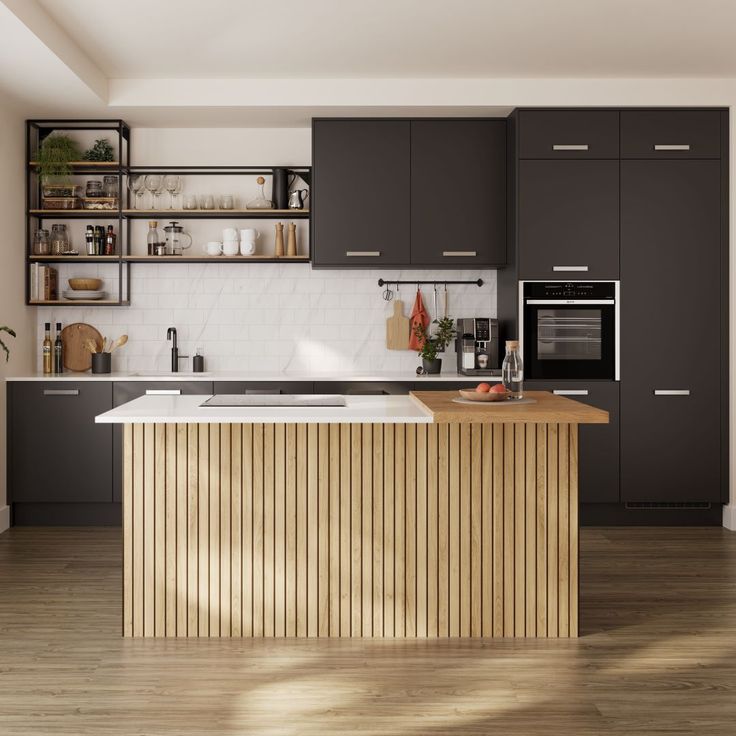 a kitchen with wooden floors and gray cabinets