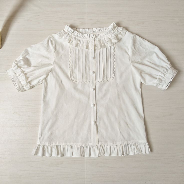 Features: It features ruffled stand collar, short sleeves, placket with five buttons, flounce hem.Attention: This price includes a shirt only, others are not included.&nbsp;Size Chart:Size (CM): Unit CM; Sizes below are measured in flat-laid position, hand measurement will have discrepancy of about 2 CM.Size(cm)XSSMLXLXXLShoulders353637383940Bust8286909498102Short / Long Sleeve Length26/5626/5626/5826/5826/6026/60Shirt Length555557575959 Casual Short Sleeve Blouse With Ruffles, Casual Short Sleeve Ruffled Blouse, Feminine Short Sleeve Shirt With Buttons, Feminine Short Sleeve Shirt For Daywear, Classic Summer Tops With Ruffles, Classic Ruffled Summer Tops, Casual Short Sleeve Blouse With Ruffle Hem, Feminine Short Sleeve Blouse With Ruffles, Feminine Short Sleeve Tops With Ruffles