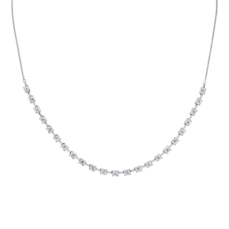 Showcase your elegant style with this sparkling necklace. Fashioned in sterling silver, this necklace boasts a glistening row of round diamonds and links along the front of the design. The diamonds are 1/2ctw, I in color, and I2 in clarity. This necklace measures 17 inches in length. Classic Diamond Necklace With Sparkling Stones For Anniversary, Classic Diamond Sparkling Necklace, Classic Diamond Necklace With Sparkling Details, Diamond White Sparkling Diamond Necklace For Formal Occasions, Classic Sparkling Necklace For Anniversary, Formal Sparkling Diamond White Necklace, Classic White Gold Diamond Necklace With Sparkling Stones, Formal White Sparkling Diamond Necklace, Classic Silver Diamond Necklace With Sparkling Stones