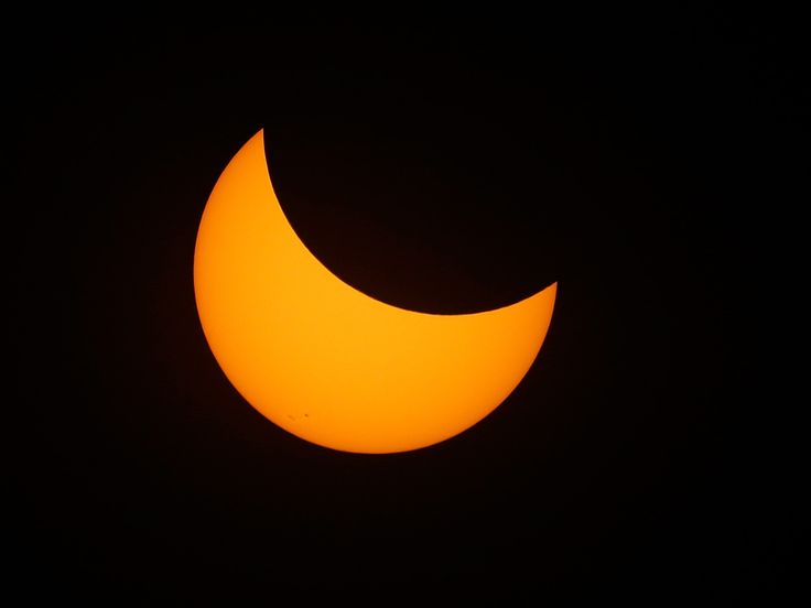 the moon is seen during a partial solar eclipse