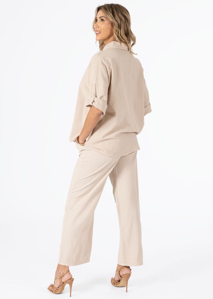 100% Cotton Imported from Peru Machine Wash Cold Modeled in size SM Model Measurements: Height 5’7”, Waist 25, Bust 31, Hips 33 Casual Beige Tops With Roll-up Sleeves, Relaxed Fit Blouse With Roll-up Sleeves For Spring, Casual Spring Collared Sets, Cotton Top With Roll-up Sleeves For Daywear, Relaxed Fit Button-up Solid Bottoms, Oversized Casual Spring Sets, Relaxed Cotton Blouse With Pockets, Button-up Loungewear Tops With Pockets, Spring Relaxed Fit Collared Sets