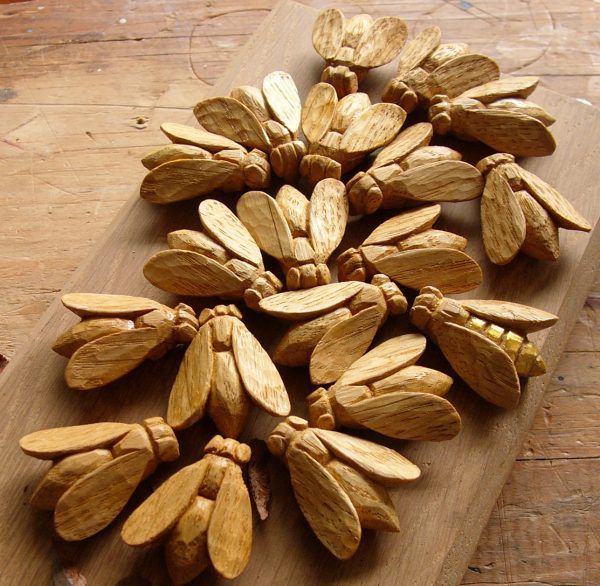 a wooden cutting board topped with lots of nuts