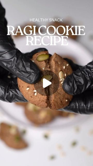 a person wearing black gloves holding up a cookie in their hands with the words, real tiny snack ragicookie recipe