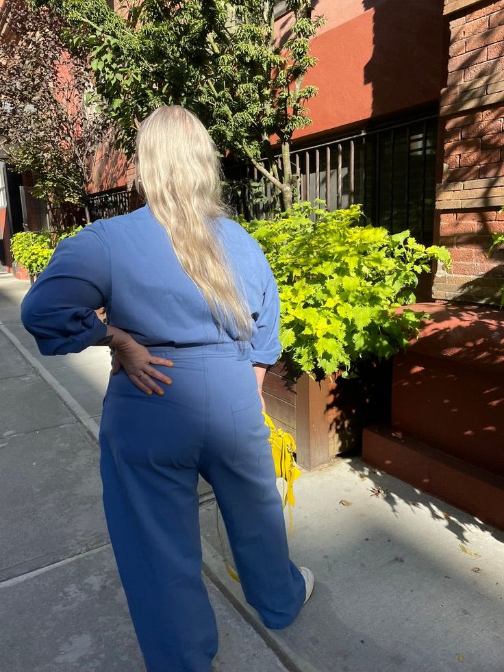 This boiler suit is made for movement and comfort, with darts at the back for a feminine touch. Contrast colors at undercollar and sleeve cuff. The style features a wide pant leg and a shorter inseam, so if you’re taller than 5’8”, you get to show off your sexy ankles (or kooky socks or Doc Martens or whatever). We recommend choosing according to your hip measurement or pant size. If you have a favorite jumpsuit please use it as a guide. Size XS fits US pant size 2-4 Chest 37”, Waist 28”, Hip 39 Blue Relaxed Fit Jumpsuits And Rompers For Fall, Blue Relaxed Fit Jumpsuits For Fall, Blue Long Sleeve Jumpsuits And Rompers For Fall, Blue Long Sleeve Overalls For Spring, Blue Denim Jumpsuit With Relaxed Fit And Long Sleeves, Full Length Jumpsuits And Rompers For Spring Workwear, Blue Long Sleeve Relaxed Fit Denim Jumpsuit, Fall Blue Jumpsuits And Rompers For Workwear, Spring Workwear Full-length Jumpsuits And Rompers