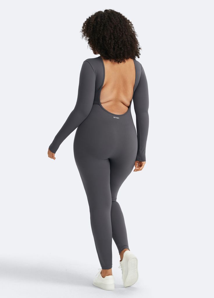 Turn heads with our Open Back Jumpsuit, designed for both comfort and style. Stay chic and cool with a breathable, open back design and soft, stretchy fabric. Perfect for casual outings, special occasions, and anything in between. Casual High Stretch Gray Bodysuit, Casual Gray High Stretch Bodysuit, Gray High Stretch Casual Jumpsuits And Rompers, Compressive Casual Bodysuit For Gym, Casual Compressive Bodysuit For Gym, Casual Stretch Jumpsuits And Rompers For Gym, Casual High Stretch Bodysuit With Thumbholes, Compressive Casual Bodysuit, Casual Gray Bodysuit For Workout