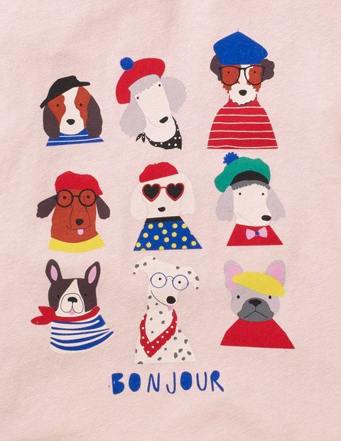 a pink shirt with dogs and hats on it's chest, featuring the words bonjou