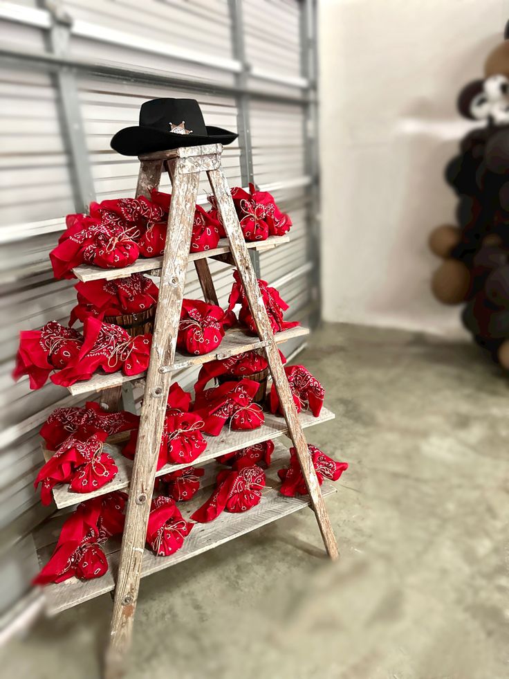 Western birthday party favors 
Cowboy birthday favors.  Rustic ladder display. Ladder shelf First Rodeo Party Centerpieces, 1st Rodeo Decorations, Rodeo Birthday Party Centerpieces, Rodeo Table Decorations, Cowboy Birthday Party Centerpieces, Rodeo Centerpieces Parties, My First Rodeo Table Decor, Rodeo Birthday Centerpieces, Neutral Cowboy Party