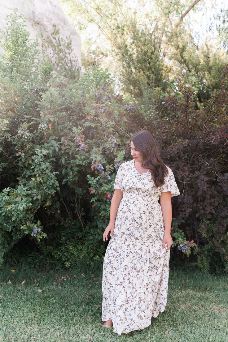 Frolicking in flower fields will be the norm when you wear the Michaela Dress. This dress features a vintage-inspired floral pattern against a neutral shade appropriate for any occasion. Its tiered, full-length skirt and cap sleeves provide coverage, while the flattering, surplice neckline keeps you cool on summer evenings. The best part? It’s also available for kids, allowing you and your daughter to spend the day twinning! STYLE INFO & CARE Smocked Waist Tiered Skirt Fully lined 100% Polyester Full Length Skirts, Surplice Neckline, Summer Evening, Tier Skirt, Flower Field, Tiered Skirt, Vintage Pattern, Floral Maxi, Keep Your Cool