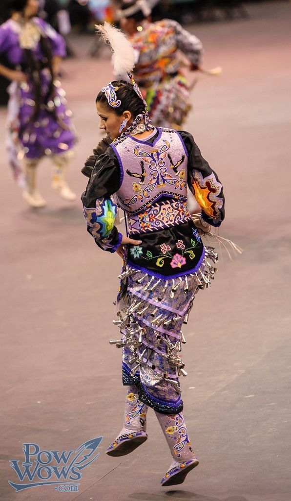 the dancers are dressed in elaborate clothing