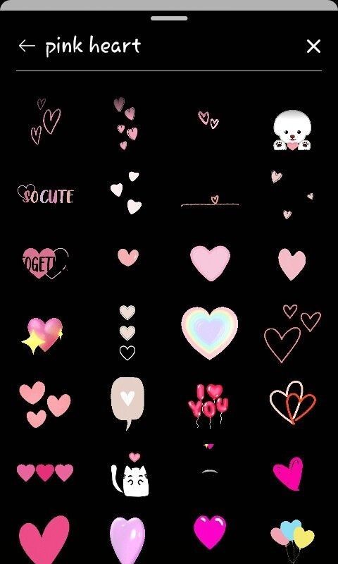 the pink heart stickers are all over the phone and it's black background