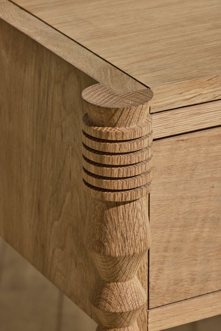 a close up view of a wooden table with woodgrains on the top and bottom