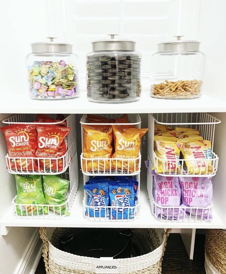 an organized pantry filled with snacks and candy