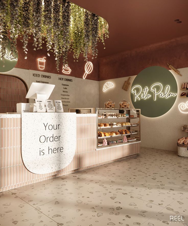 the interior of a deli with an advertisement on the wall and plants hanging from the ceiling