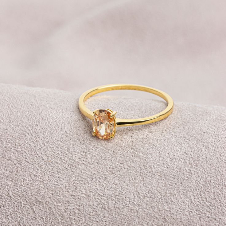 Citrine stone is believed to represent abundance and fertility. Our citrine ring has a stylish design and is suitable for daily use. A nice gift that can make you and your loved ones happy. The birthstone of those born in November is Citrine. F E A T U R E S * Made to Order. * Gold KT: 14K * Gold Color: Yellow Gold, Rose Gold, White Gold * Citrine Carat: 0.70 ct. * Stone Height: 7,00 mm / 0.28 inch * Stone Width: 5,00 mm / 0.20 inch * Setting Type: Bezel Setting * Ready to Ship in 1-3 Business Days * 100% US sourced * 2 Years Warranty * Free Express International Shipping * Free returns within 14 days from the order date Oval Cut 14K Solid Gold Citrine Ring, Mother's Day Gift, 14K Gold Birthstone Ring, Oval Cut Citrine Ring, Women's Jewelry, Minimalist Ring We loved making our jewelry with Yellow Gold Topaz Crystal Ring As Gift, Gold Rings With Topaz Birthstone, Promise Citrine Birthstone Ring, Yellow Gold Citrine Birthstone Crystal Ring, Gold Crystal Ring With Topaz Birthstone, Citrine Birthstone Ring With Prong Setting As Gift, Gold Citrine Birthstone Promise Ring, Gold Topaz Birthstone Ring With Prong Setting, Gold Citrine Birthstone Ring For Promise