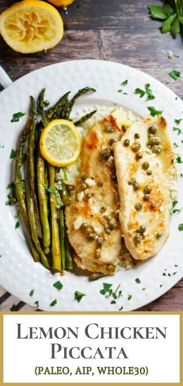 lemon chicken piccata with asparagus on a white plate