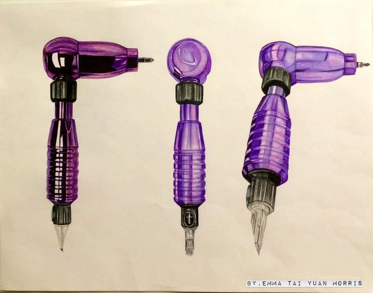 three different types of purple pens sitting next to each other