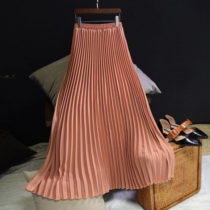 Summer Vintage Women's Long Pleated Skirt ﻿is perfect for any occasion. It is made from polyester and has a pleated design, which gives it a casual feel. Its length is mid-calf, which makes it suitable for wearing with sandals or heels. This skirt can also be used as an evening dress also. Specifications: Material: Polyester Age: Ages 18-35 Years Old Silhouette: Pleated Decoration: NONE Gender: WOMEN Waistline: Empire Pattern Type: Solid Style: Casual Dresses Length: Mid-Calf Size: One size--80 Vintage Harem Pants, Chiffon Skirts, High Waisted Maxi Skirt, Pleated Long Skirt, Style Japonais, Korean Casual, Long Skirts For Women, Moda Plus, Dark Beige