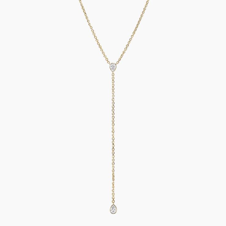 Pear Lab Diamond Bezel Lariat Necklace - 14K Yellow Gold. A chic classic, this lariat necklace features two bezel-set pear lab diamonds gracefully resting on a chain that can be adjusted to 18, 19, or 20 inches to suit individual preference (3/8 total carat weight). Classic Lariat Necklace With Delicate Chain, Classic Lariat Drop Necklace For Anniversary, Classic Teardrop Drop Necklace With Adjustable Chain, Classic Drop Necklace With Adjustable Chain, Elegant Yellow Gold Teardrop Lariat Necklace, Classic Diamond Lariat Necklace, Engagement Ring Style Guide, Ring Style Guide, Tacori Engagement Rings