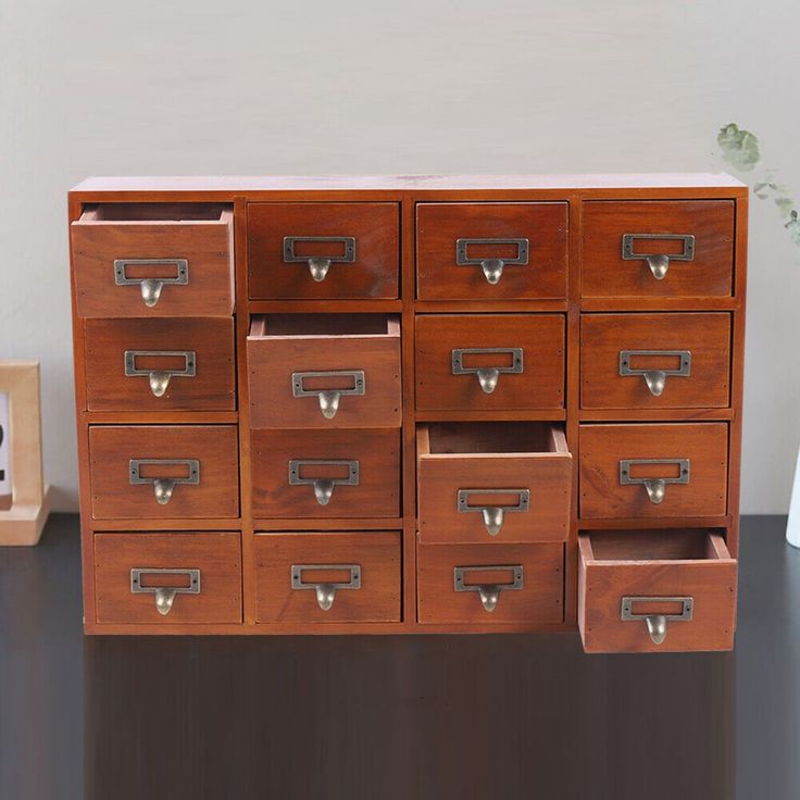 Similar Style Organize your space with style using our Traditional 16 Drawers Wood Apothecary Chest Storage Cabinet. Apothecary Chest, Desk Drawer Organizer, Library Desk, Medicine Cabinet Organization, Tea Box Storage, Drawer Labels, Chest Storage, Craft Cabinet, Rustic Desk