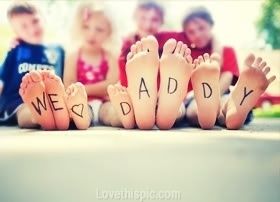 a group of children sitting on the ground with their feet covered in words that read, special message for dad