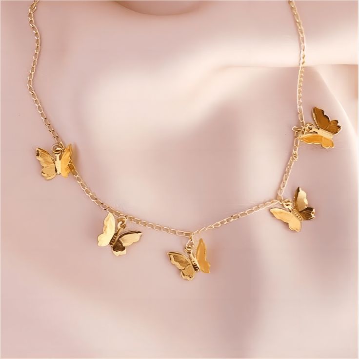 DescriptionButterfly Choker NecklaceProduct details: Size: 15.70" + 2.70" extWeight: 0.29 ozMaterial: 18k Alloy MetalColor: Gold/SilverHypoallergenic: Yes "Flutter into style with our Butterfly Choker Necklace! This unique piece features delicate butterflies for a fun and playful look. Perfect for adding a touch of whimsy to any outfit. 🦋" Butterfly Necklace Aesthetic, Aesthetic Choker, Butterfly Choker Necklace, Gold Butterfly Necklace, Butterfly Choker, Dainty Butterfly, Necklace Aesthetic, Butterfly Necklace Gold, Gold Designs