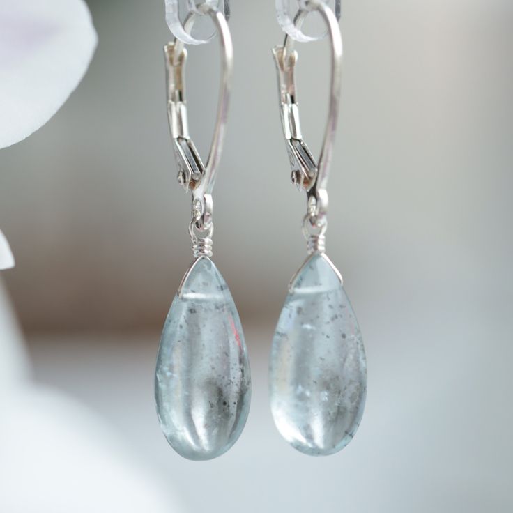 Genuine Moss Aquamarine Dangle Earrings. Gift for wife on 19th Anniversary or on March Birthday. Handmade, Simple jewelry. Thee model wears earrings in 14k White Gold MATERIALS: * Natural Moss Aquamarine * dangling from leverbacks * 14k Gold (Yellow, Rose or White Rhodium Plated) * beautiful branded gift box * card about aquamarine SIZE: * stones: 15x7.5 mm * the earrings: 3cm (1 3/16") AQUAMARINE: ∙ March Birthstone ∙ 19th Wedding Anniversary Gemstone ∙ Talisman for Aries, Pisces ∙ Throat Chakr Teardrop Lever Back Jewelry For Anniversary, Formal Dangle Jewelry With Lever Back, Long Drop Ear Wire Jewelry For Anniversary, Nickel-free Drop Jewelry For Anniversary, Dangle Lever Back Earrings For Anniversary, Nickel-free Adjustable Briolette Earrings, Dangle Earrings With Lever Back For Anniversary, Silver Lever Back Jewelry For Gift, Adjustable Drop Earrings With Ear Wire