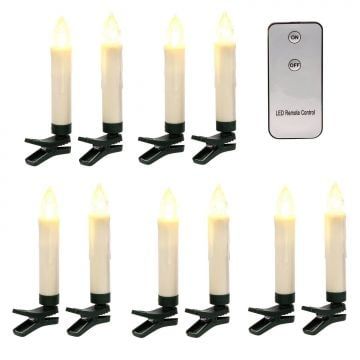 eight white candles with remote controls on each side