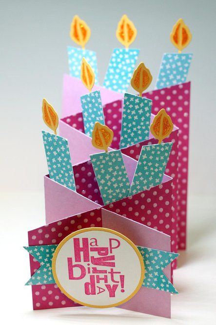 an image of a birthday card with candles in the box on it's side