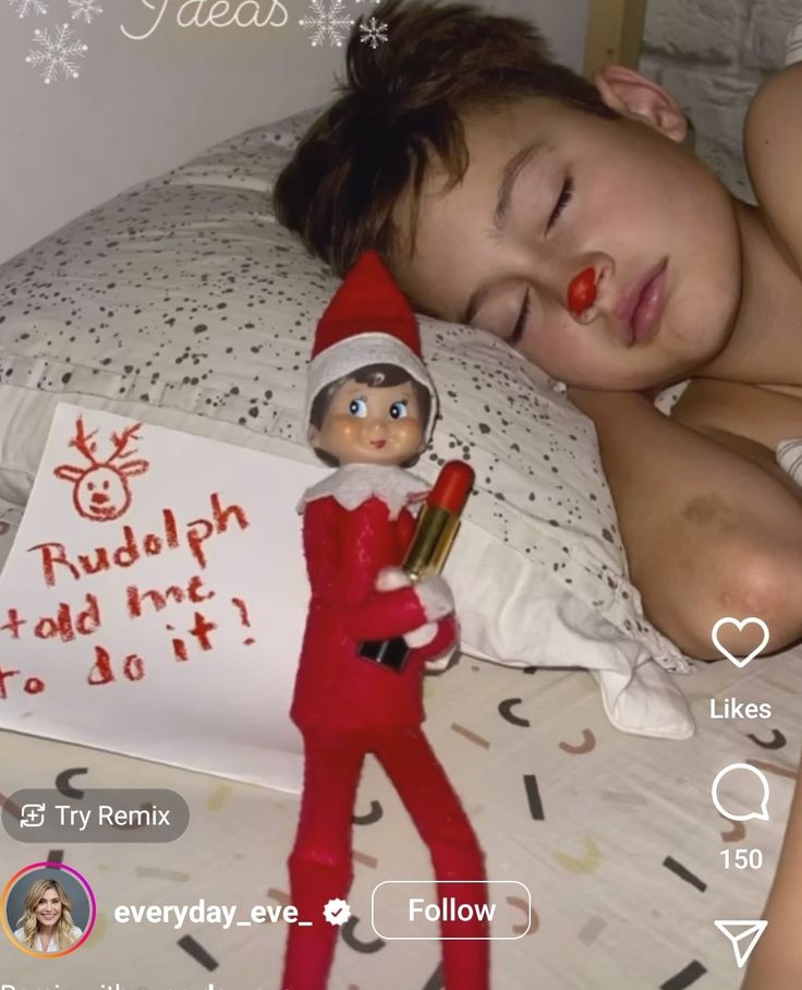 an elf is sleeping on the bed with a sign that says rudolph told her to do it