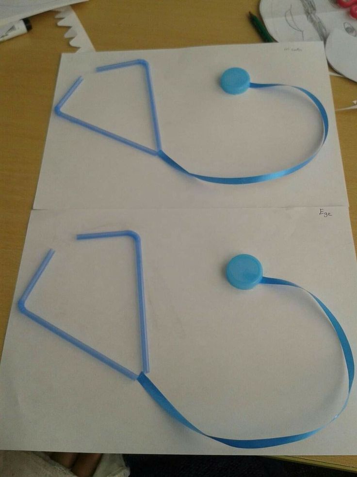 two pieces of paper that have been made to look like stethoscopes