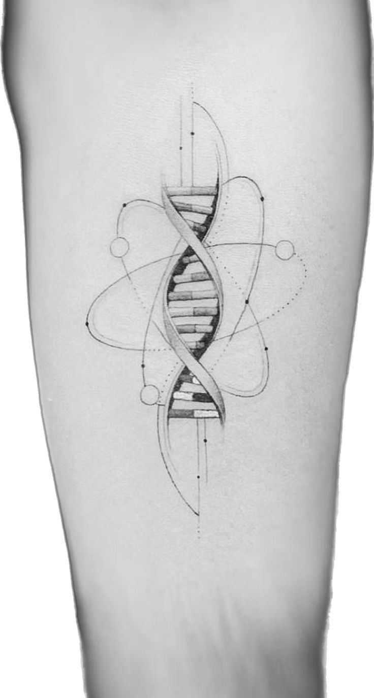 a black and white photo of a tattoo design on the leg, with an image of a